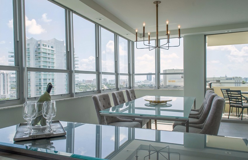 Floridian Views Surround The Dramatic Dining Area